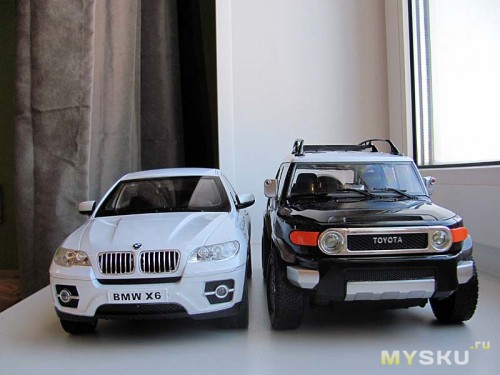 BMW X6 и Toyota FJ Cruiser